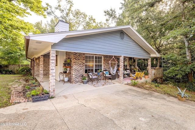 view of front of home featuring a patio area