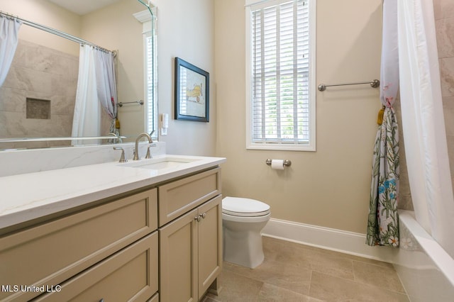 full bathroom featuring vanity, shower / tub combo with curtain, baseboards, toilet, and tile patterned flooring