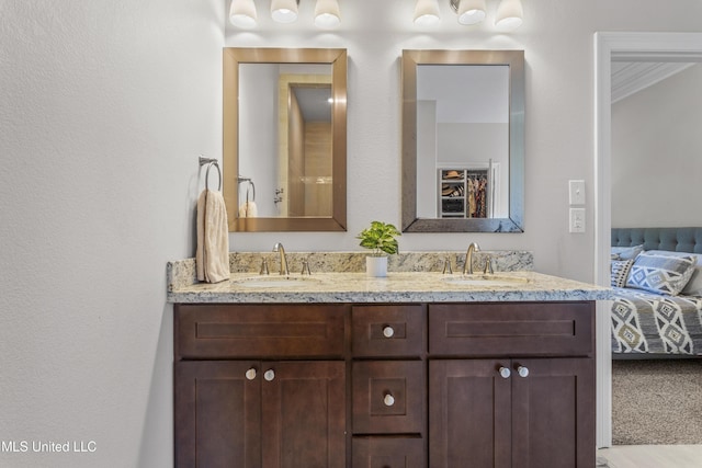 5705 Via Toscana, Ocean Springs, MS 39564 - full bath with ensuite bath, double vanity, and crown molding