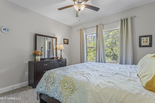 5705 Via Toscana, Ocean Springs, MS 39564 - bedroom with carpet floors, baseboards, and ceiling fan