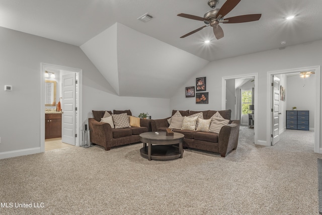 5705 Via Toscana, Ocean Springs, MS 39564 - living room featuring light colored carpet, a ceiling fan, baseboards, vaulted ceiling, and recessed lighting