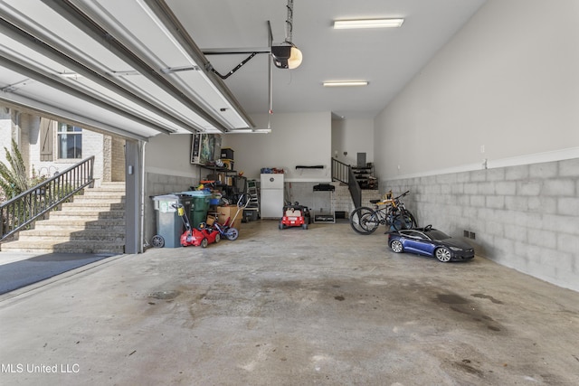 5705 Via Toscana, Ocean Springs, MS 39564 - garage featuring a garage door opener
