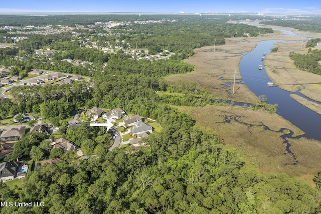 5705 Via Toscana, Ocean Springs, MS 39564 - aerial view of property and surrounding area with a nearby body of water, a forest, and nearby suburban area