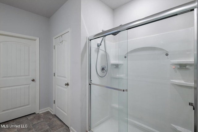 2250 Hyacinth Ln, Hernando, MS 38632 - bathroom featuring a stall shower