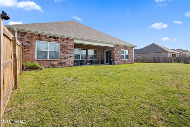 2250 Hyacinth Ln, Hernando, MS 38632 - back of property with brick siding and a fenced backyard