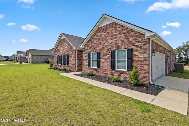 2250 Hyacinth Ln, Hernando, MS 38632 - view of front of home featuring brick siding, a garage, a front lawn, and concrete driveway