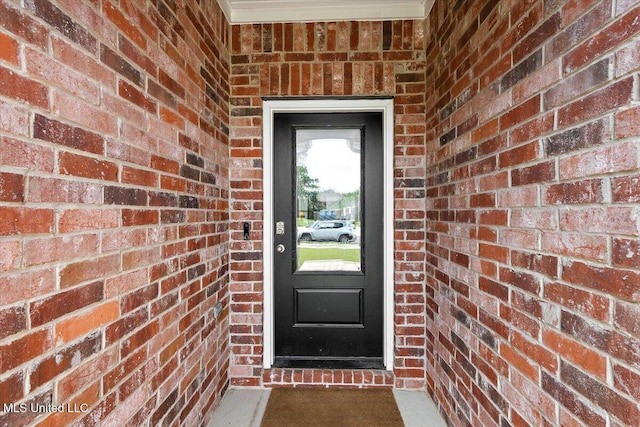 2250 Hyacinth Ln, Hernando, MS 38632 - doorway to property featuring brick siding