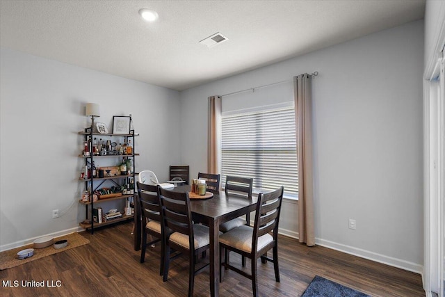 2250 Hyacinth Ln, Hernando, MS 38632 - dining space with dark wood-style flooring and baseboards