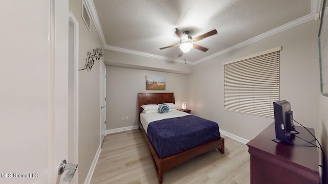 bedroom with ornamental molding and light wood-type flooring