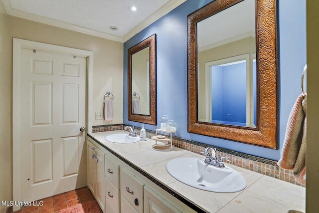 full bathroom featuring double vanity, crown molding, and a sink