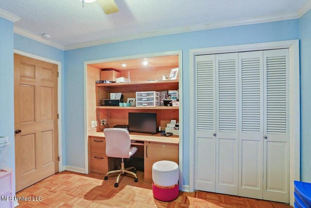 office area with ornamental molding, a textured ceiling, and baseboards