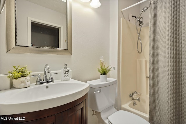 full bathroom with vanity, shower / bath combination with curtain, and toilet