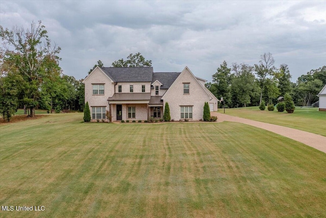 view of front of home featuring a front lawn