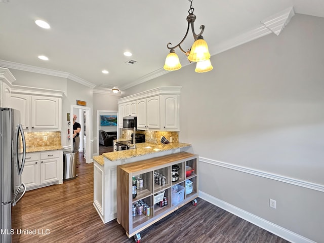 kitchen featuring visible vents, decorative backsplash, white cabinetry, light stone counters, and appliances with stainless steel finishes