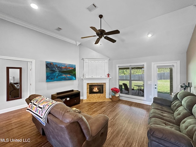 living room featuring baseboards, a ceiling fan, vaulted ceiling, and visible vents