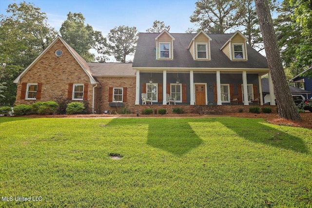 121 Countrywood Cir, Clinton, MS 39056 - cape cod house with a front yard and brick siding