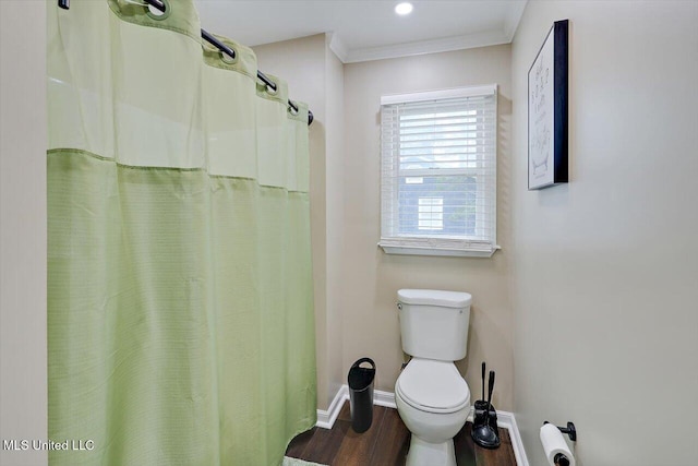 121 Countrywood Cir, Clinton, MS 39056 - bathroom with toilet, wood finished floors, crown molding, and baseboards