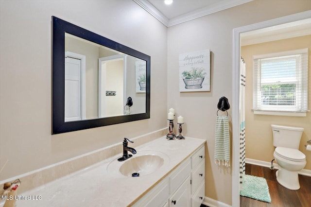 121 Countrywood Cir, Clinton, MS 39056 - full bathroom with vanity, toilet, ornamental molding, wood finished floors, and baseboards
