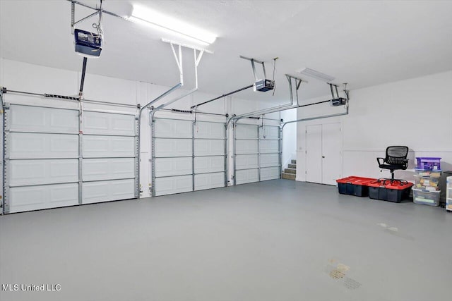 121 Countrywood Cir, Clinton, MS 39056 - garage featuring a garage door opener