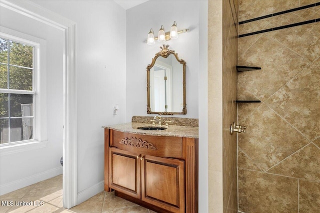 6313 Hermosa Dr, Ocean Springs, MS 39564 - full bathroom featuring vanity, tile patterned flooring, tiled shower, and toilet