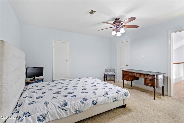 6313 Hermosa Dr, Ocean Springs, MS 39564 - carpeted bedroom featuring ceiling fan