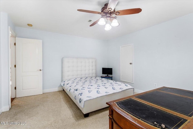 6313 Hermosa Dr, Ocean Springs, MS 39564 - bedroom featuring light carpet, baseboards, and ceiling fan