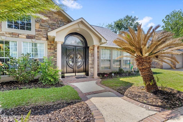 6313 Hermosa Dr, Ocean Springs, MS 39564 - entrance to property featuring stone siding and a lawn