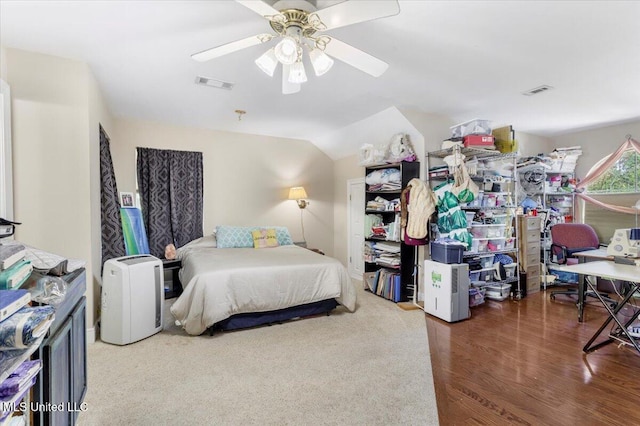 6313 Hermosa Dr, Ocean Springs, MS 39564 - bedroom featuring a ceiling fan, lofted ceiling, and wood finished floors