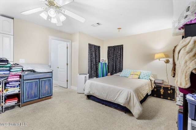 6313 Hermosa Dr, Ocean Springs, MS 39564 - bedroom with light carpet and ceiling fan