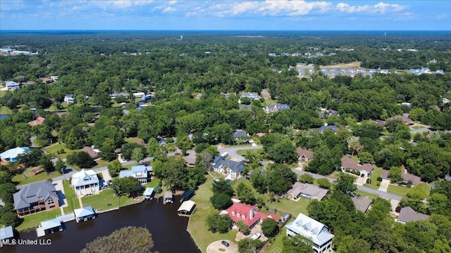 6313 Hermosa Dr, Ocean Springs, MS 39564 - view of property location with a nearby body of water and a heavily wooded area