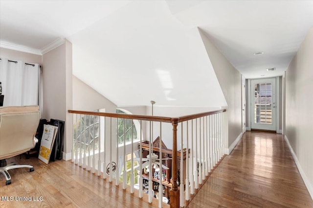 6313 Hermosa Dr, Ocean Springs, MS 39564 - corridor featuring wood finished floors, baseboards, and ornamental molding