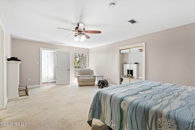 6313 Hermosa Dr, Ocean Springs, MS 39564 - bedroom with carpet floors, baseboards, and ceiling fan