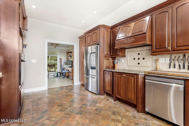 6313 Hermosa Dr, Ocean Springs, MS 39564 - kitchen featuring stainless steel appliances, baseboards, tasteful backsplash, recessed lighting, and premium range hood