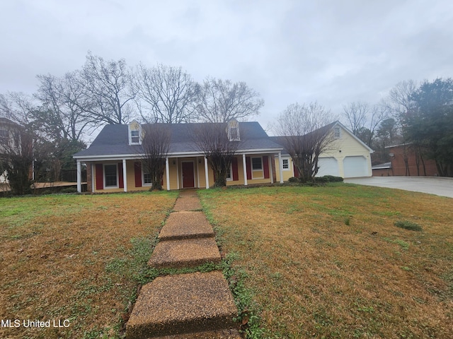 view of front facade with a garage and a front yard