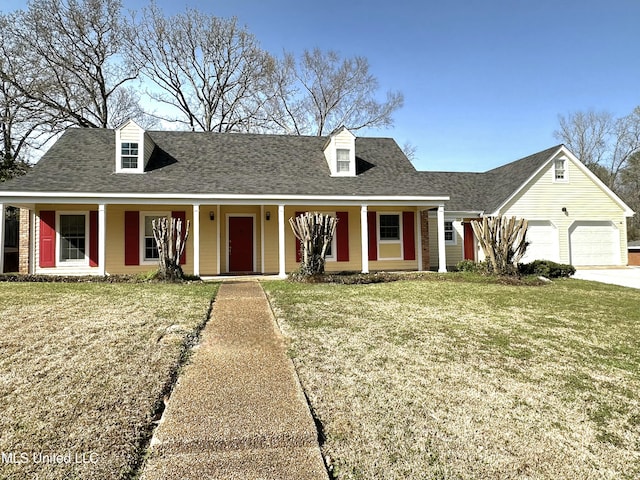 1618 Pear Orchard Pl, Jackson, MS 39211 - new england style home with driveway, a front lawn, covered porch, an attached garage, and a shingled roof