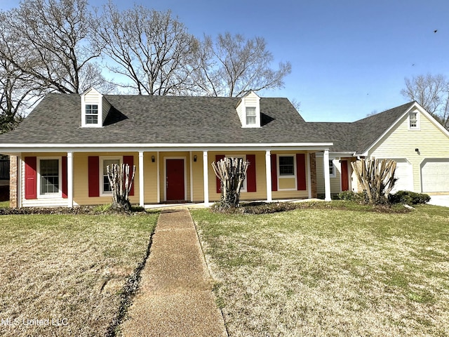 1618 Pear Orchard Pl, Jackson, MS 39211 - cape cod home with an attached garage, covered porch, a front lawn, and a shingled roof