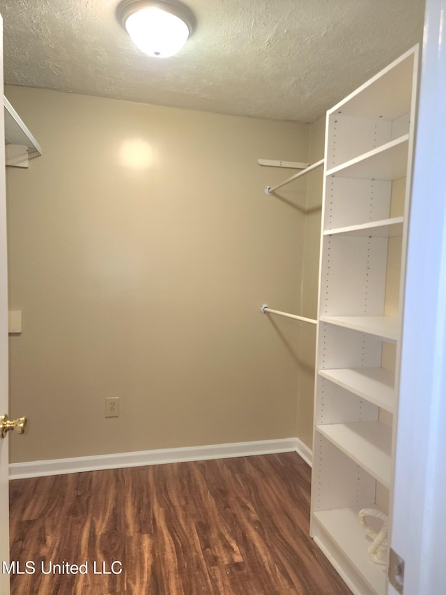 1618 Pear Orchard Pl, Jackson, MS 39211 - spacious closet featuring dark wood-style flooring