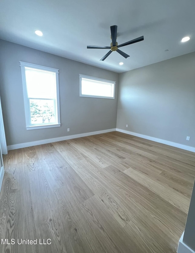 1851 Beach Blvd Unit 4, Biloxi, MS 39531 - unfurnished room featuring ceiling fan, wood finished floors, baseboards, and recessed lighting