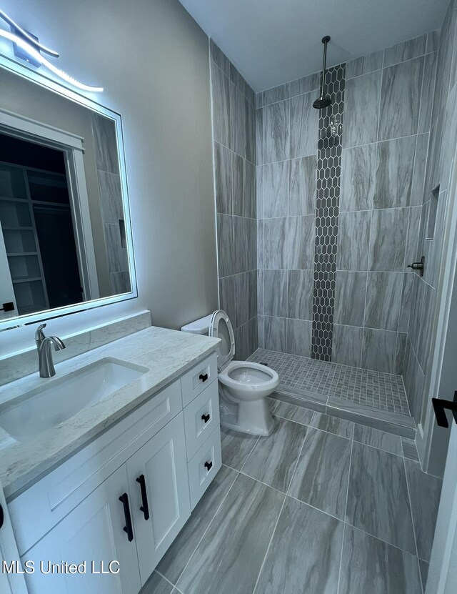 1851 Beach Blvd Unit 4, Biloxi, MS 39531 - full bath with vanity, toilet, and a tile shower