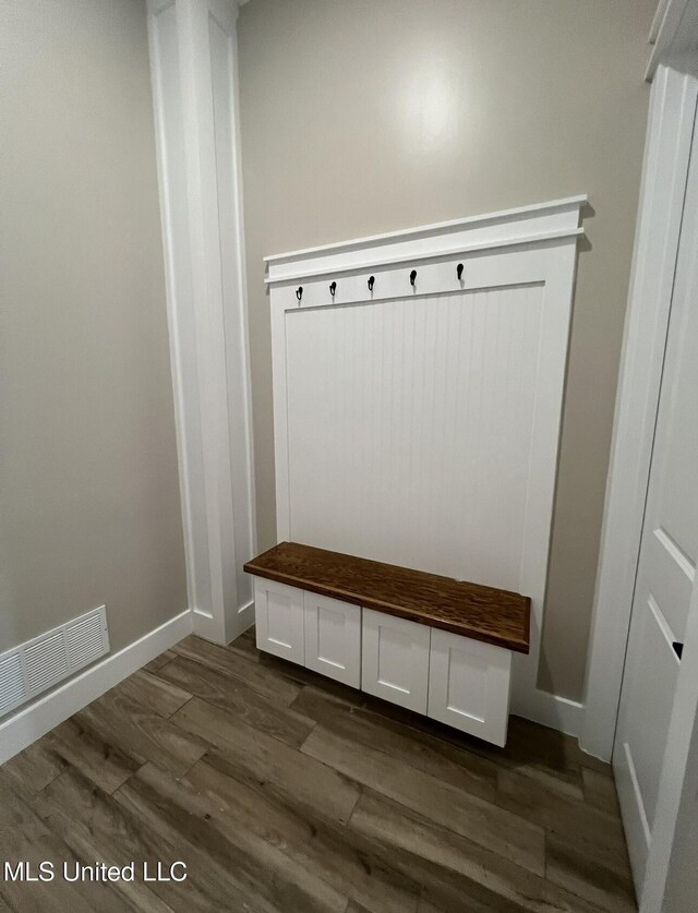 1851 Beach Blvd Unit 4, Biloxi, MS 39531 - mudroom with dark wood-style flooring and baseboards
