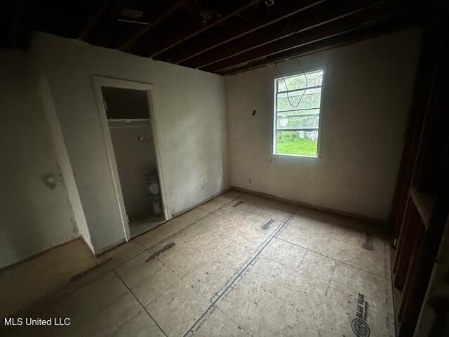 11187 Dewey Lawrence Cir, Diberville, MS 39540 - unfurnished bedroom featuring a closet