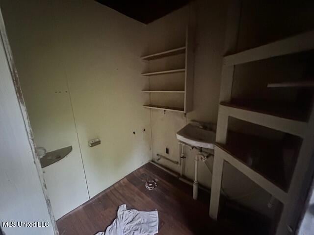 11187 Dewey Lawrence Cir, Diberville, MS 39540 - laundry area featuring dark wood-style floors