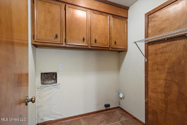 101 Lake Of Pines Dr, Jackson, MS 39206 - washroom featuring baseboards, cabinet space, and hookup for a washing machine