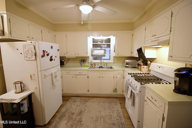 kitchen featuring ceiling fan, white cabinetry, ornamental molding, sink, and white appliances