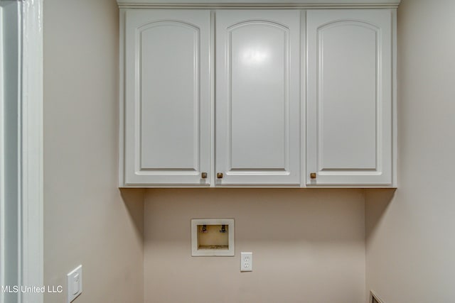 laundry room featuring cabinet space and hookup for a washing machine