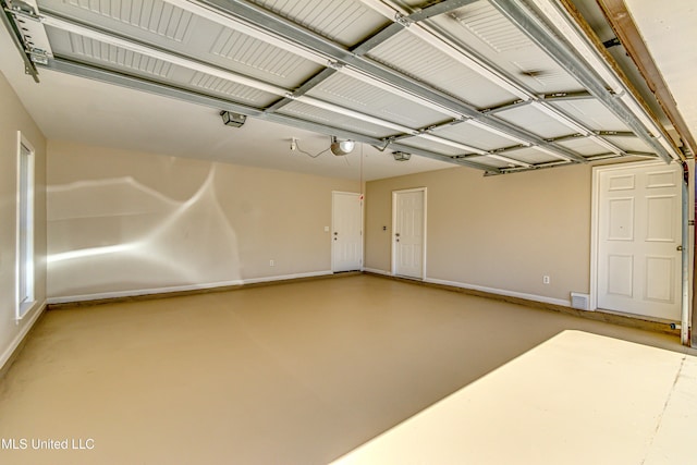 garage featuring baseboards