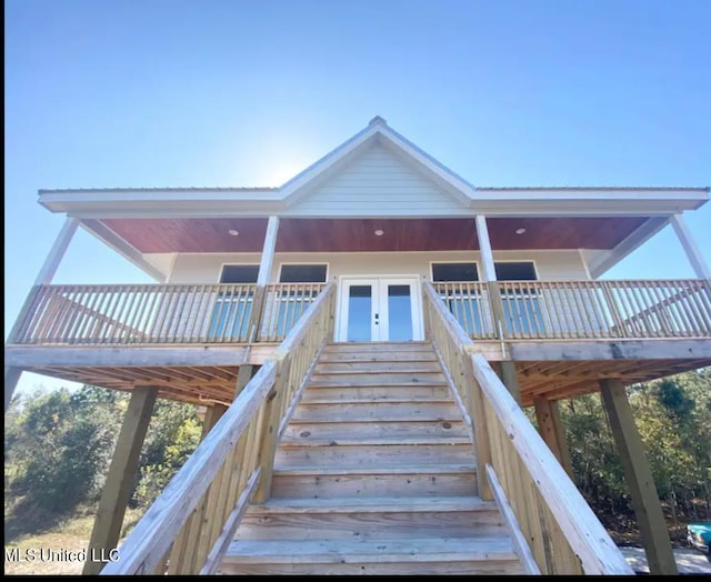 view of front of home with a deck