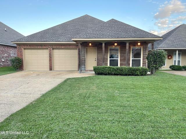 view of front facade with a front lawn and a garage