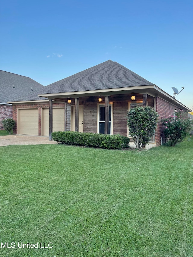 single story home with a front lawn and a garage