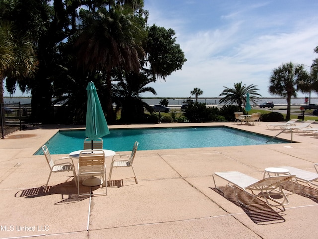 view of pool featuring a patio area